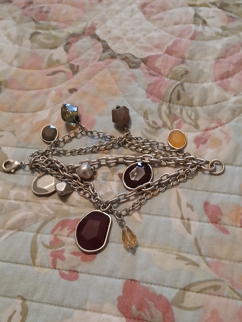 Gold Tone Multi-Charm Bracelet with Deep Purple and Amber Accents